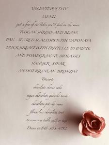 einen handschriftlichen Brief mit einer Rose auf einem weißen Papier in der Unterkunft The Country Inn in Stone Ridge