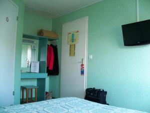 TV a/nebo společenská místnost v ubytování Fasthotel Lille Aéroport Lesquin