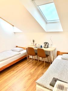 A bed or beds in a room at Pohoda Ubytovanie Stupava