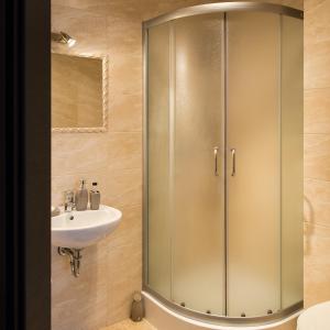 a bathroom with a shower and a sink at Motel LESTA in Lachówka Duża