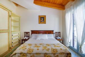 Katil atau katil-katil dalam bilik di Intero appartamento Fronte mare Valter II