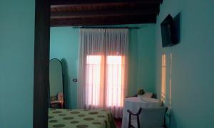 A bed or beds in a room at El Rincon Del Villar