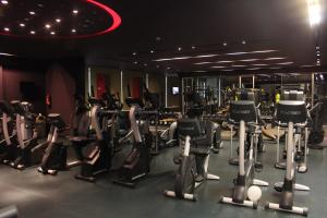 a gym with a bunch of tread machines in it at Royal Thalassa Monastir in Monastir
