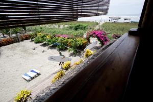 Garður fyrir utan Canoa Suites