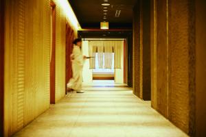 Postel nebo postele na pokoji v ubytování Royal Pines Hotel Urawa