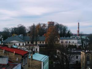 a view of a city with buildings and a factory at Upper Apart in Cieszyn