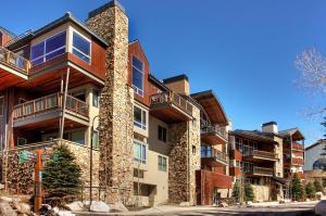 an apartment building with balconies on the side of it at Vail Residences at Cascade Village, a Destination by Hyatt Residence in Vail