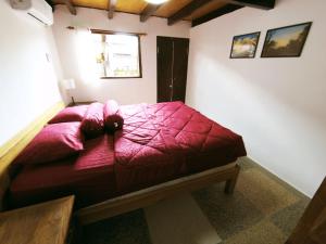 Postel nebo postele na pokoji v ubytování Capung Guesthouse