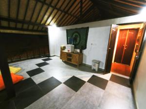 TV a/nebo společenská místnost v ubytování Capung Guesthouse