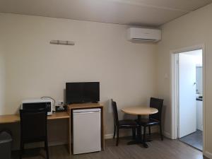 Kuchyň nebo kuchyňský kout v ubytování Dandenong Motel