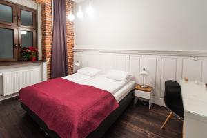 Posteľ alebo postele v izbe v ubytovaní Good Time Aparthotel