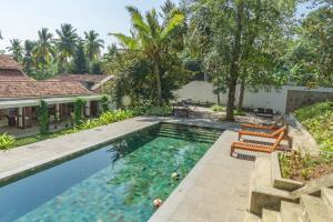 an image of a swimming pool in a villa at Kiri Palu in Ahangama
