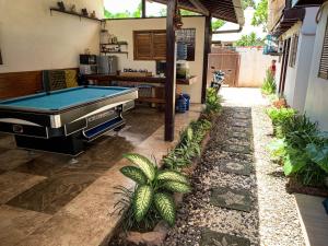 Stolní tenis v ubytování Capung Guesthouse nebo okolí