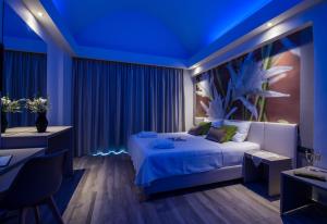 Postel nebo postele na pokoji v ubytování Incognito Creta Luxury Suites and More