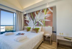 Postel nebo postele na pokoji v ubytování Incognito Creta Luxury Suites and More