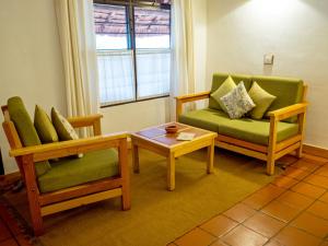 Posezení v ubytování Spice Village Thekkady - A CGH Earth Experience