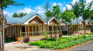 a row of cottages at a resort at Anka Resort in Naro Moru