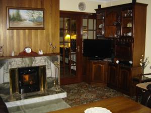 TV a/nebo společenská místnost v ubytování Springlawn + 12 fotografií