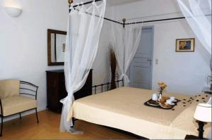 Postel nebo postele na pokoji v ubytování Tzekos Villas