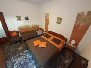 Posteľ alebo postele v izbe v ubytovaní Saglia Apartments