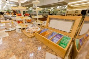 a store with a counter with a display of food at Kremlyovskiy Park in Ryazan