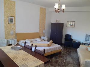 Posteľ alebo postele v izbe v ubytovaní Saglia Apartments