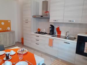Kuchyňa alebo kuchynka v ubytovaní Saglia Apartments