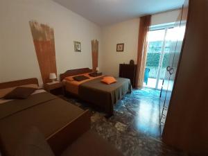Posteľ alebo postele v izbe v ubytovaní Saglia Apartments