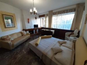 Posteľ alebo postele v izbe v ubytovaní Saglia Apartments