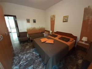 Posteľ alebo postele v izbe v ubytovaní Saglia Apartments