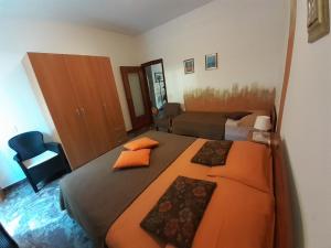 Posteľ alebo postele v izbe v ubytovaní Saglia Apartments