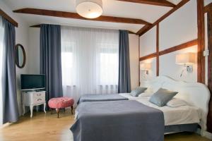 Кровать или кровати в номере Meduza Hotel & Spa