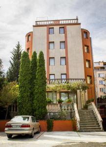 a car parked in front of a building at Family Hotel Saint Iliya in Burgas City