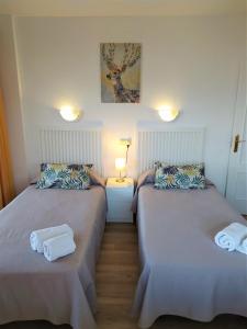 Posteľ alebo postele v izbe v ubytovaní Apartamento 714 en edificio Stella Maris + 6 fotografií