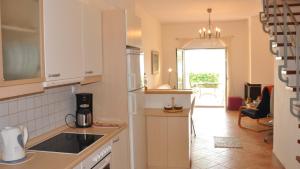 a kitchen with a sink and a counter top at Blue Haven Maisonette, Nikiti #FeelsLikeHome in Skála Nikíta +10 photos