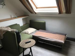 Posezení v ubytování Hotel Pieter de Coninck