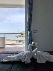 Posteľ alebo postele v izbe v ubytovaní 100 passi dal mare