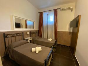 Postel nebo postele na pokoji v ubytování Park Hotel Serenissima