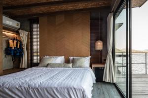 A bed or beds in a room at Z9 Resort