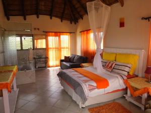 Зона вітальні в Baobab - NUDE - SunEden Family Naturist Resort