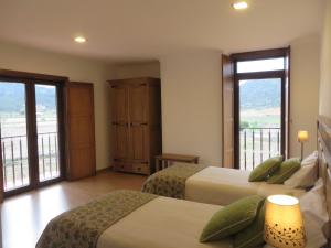 Ένα ή περισσότερα κρεβάτια σε δωμάτιο στο Quinta do Palame +43 φωτογραφίες