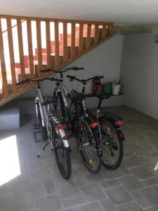 a group of bikes parked in a garage at Ferienhaus Werner in Mönchhof