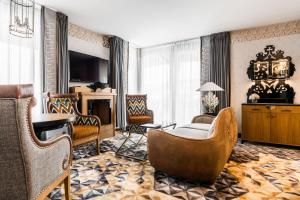 Televízia a/alebo spoločenská miestnosť v ubytovaní Bachleda Residence Zakopane
