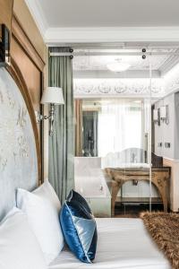 Postel nebo postele na pokoji v ubytování Bachleda Residence Zakopane