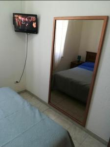 Ліжко або ліжка в номері Casa vacanze Sardegna (Viddalba)