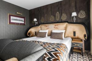 Postel nebo postele na pokoji v ubytování Bachleda Residence Zakopane