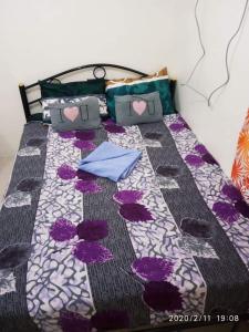 Postelja oz. postelje v sobi nastanitve Urban Deca Tondo Manila by Gracey's Place Unit 3