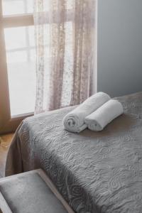 Letto o letti in una camera di Hotel panorama svaneti