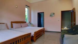 Voodi või voodid majutusasutuse Find Alice Homestays toas