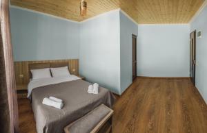 Letto o letti in una camera di Hotel panorama svaneti